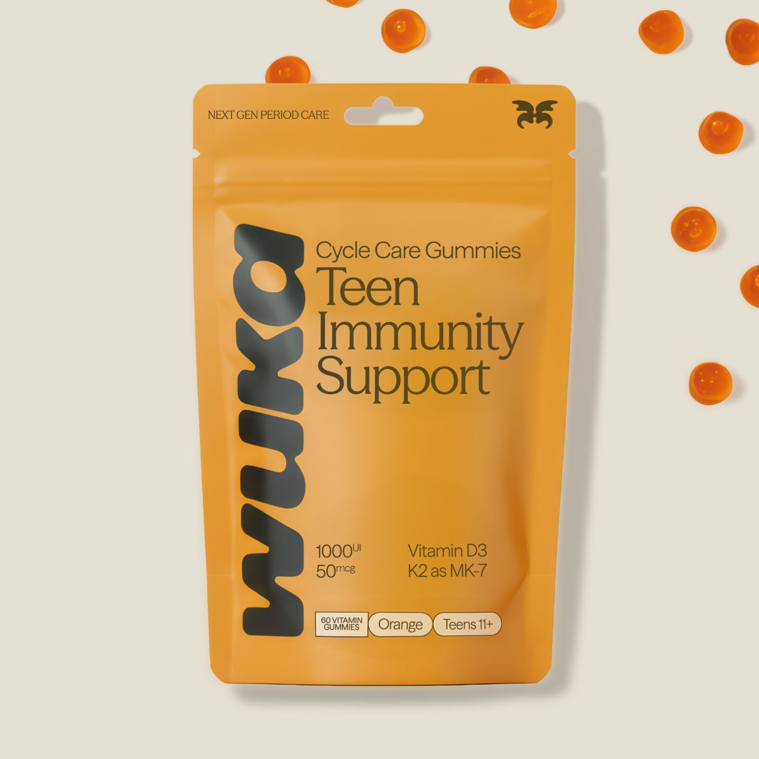 WUKA teen immunity support gummies pouch with scattered orange gummies, highlighting ingredients like vitamin D3 and K2 for teens aged 11–17.