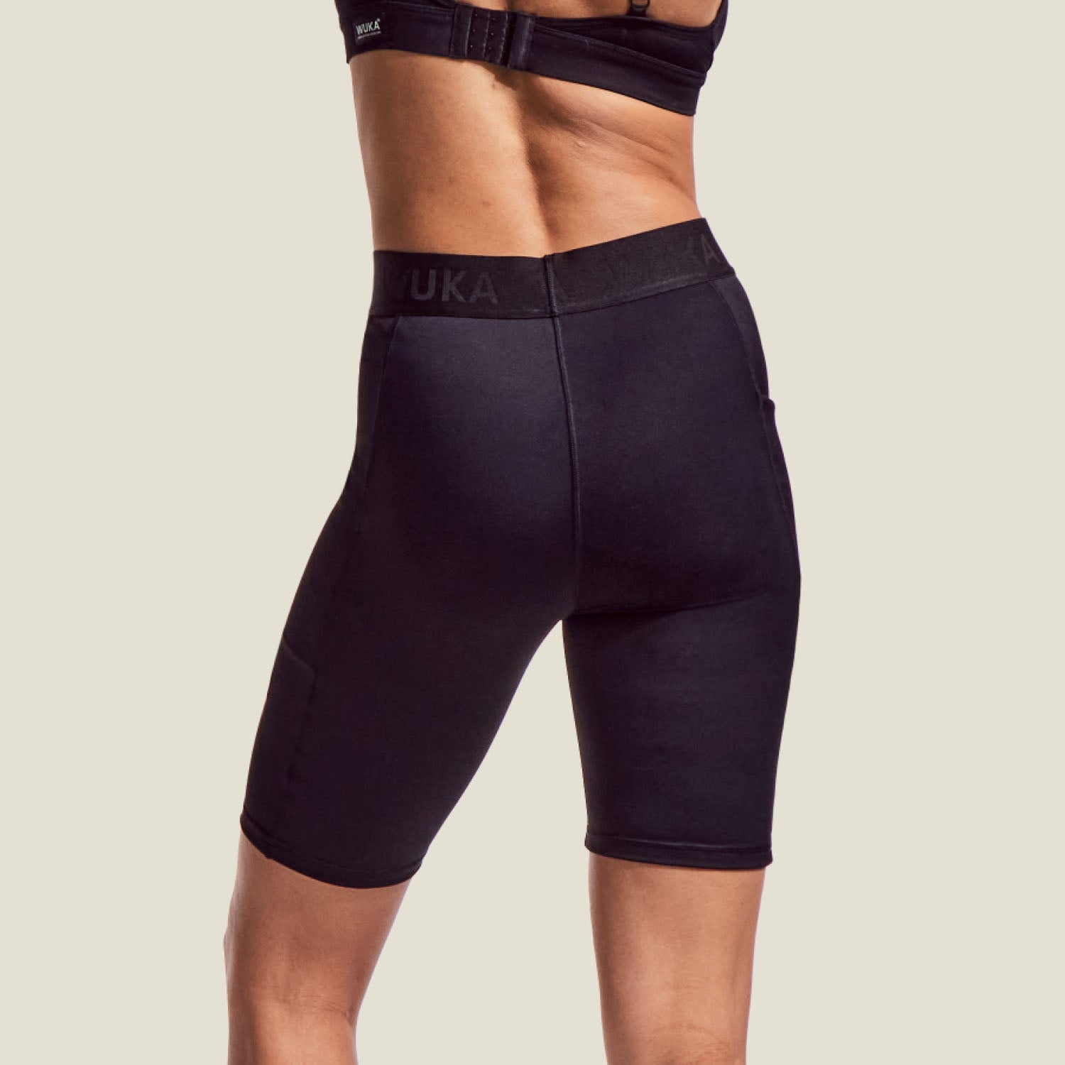 Rear view of WUKA medium flow period cycling shorts demonstrating seamless, snug fit and leak-proof coverage.