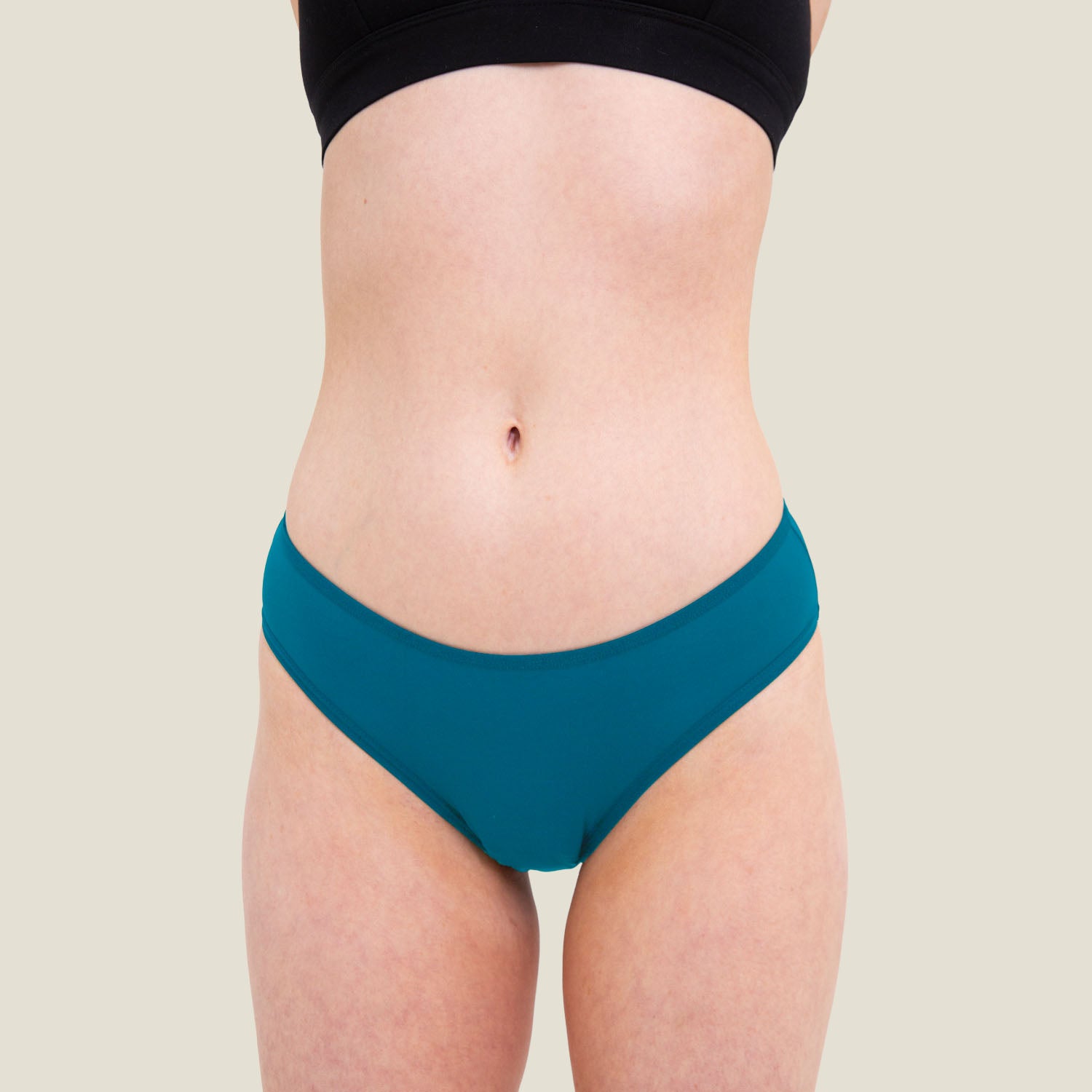 Close-up front view of WUKA blue period-proof bikini bottom for light flow.