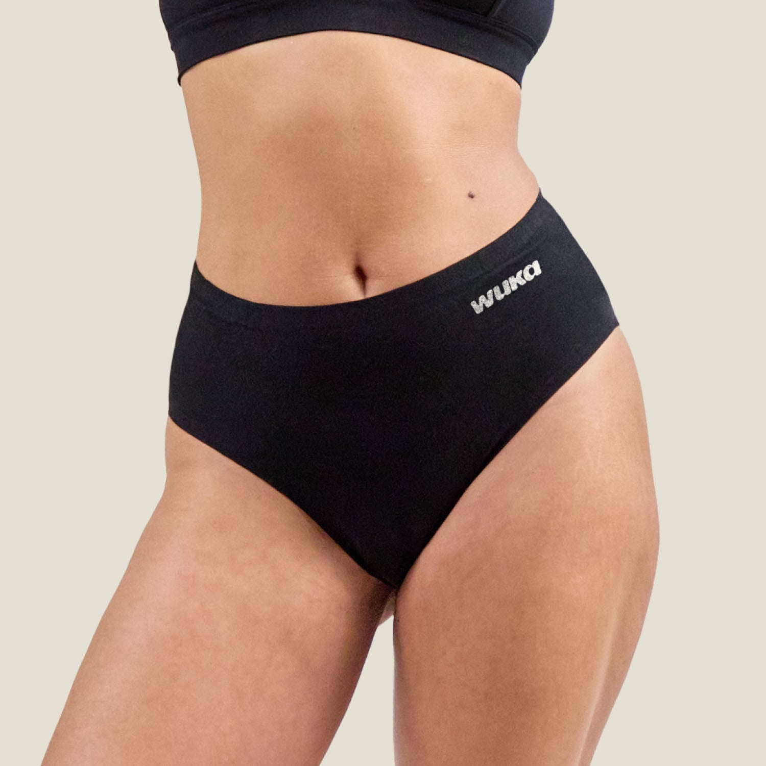 Close-up front image of WUKA Stretch Cotton Midi Brief heavy flow underwear, showcasing high-waisted fit and secure leak-proof design.