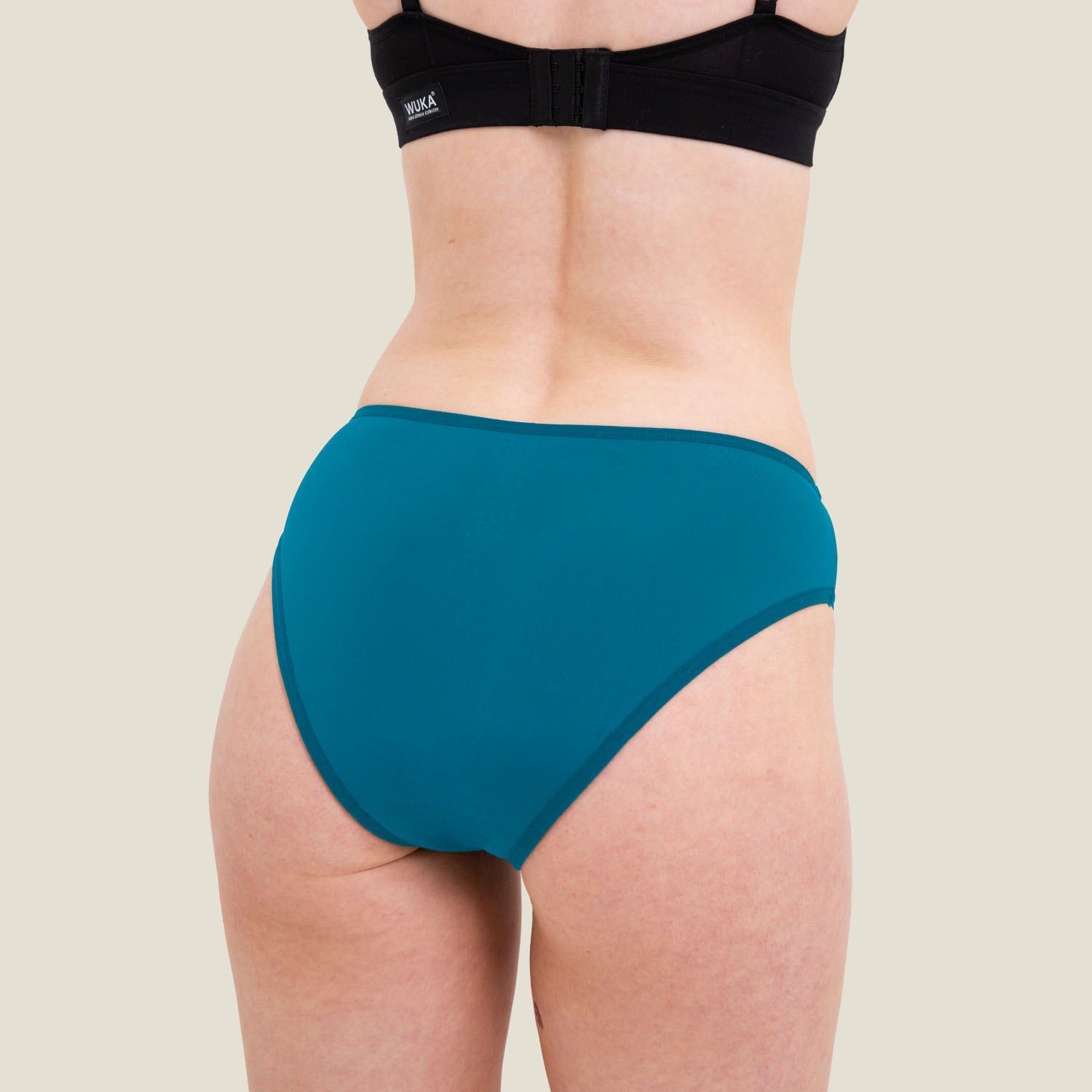 Back view of WUKA light flow swim bikini bottom offering secure coverage and leak-proof performance.