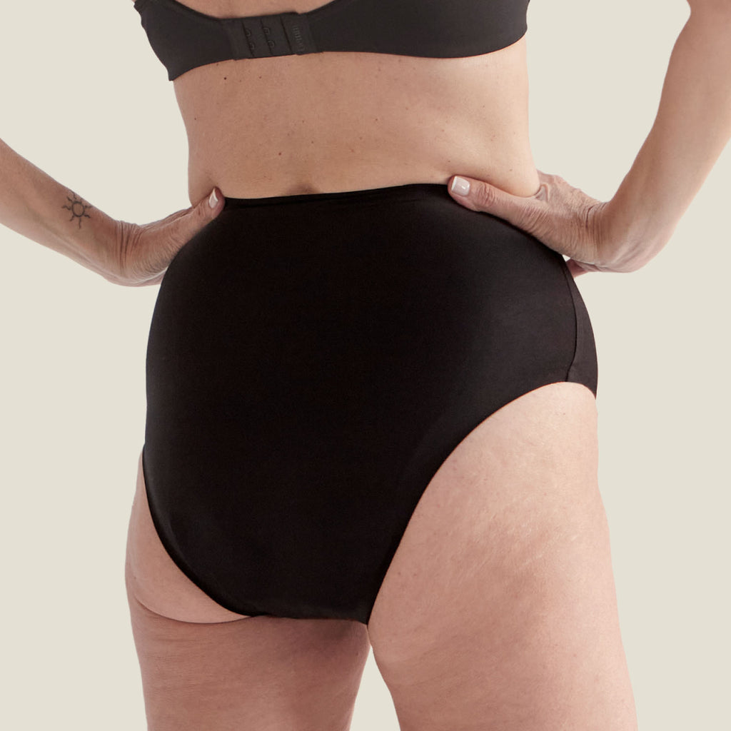 Back view of the Drytech™ High Waist Incontinence Brief in black, highlighting full coverage and discreet protection.