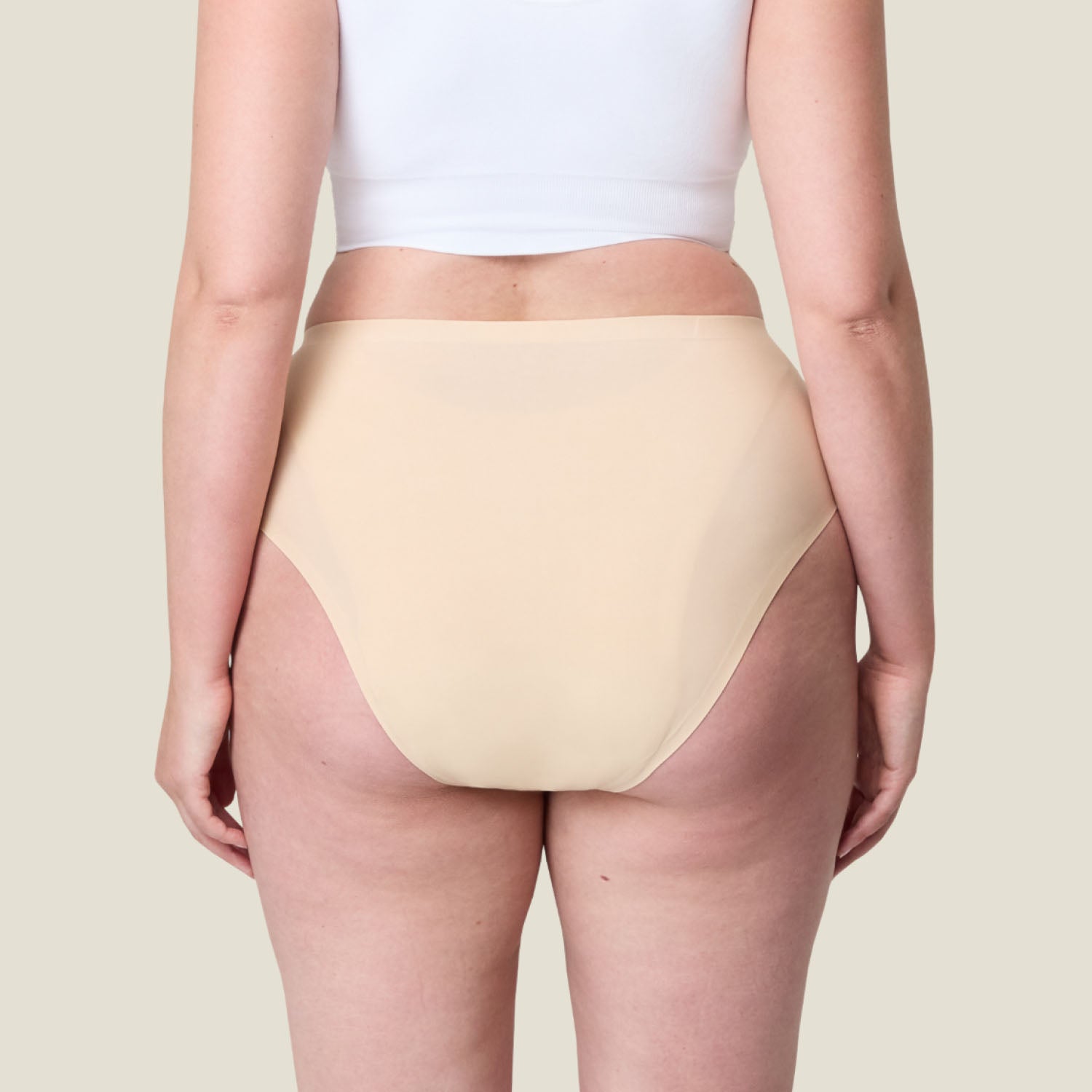 Back view of WUKA Light Nude heavy flow period underwear, showing full coverage and seamless comfort for all-day leak-proof protection.