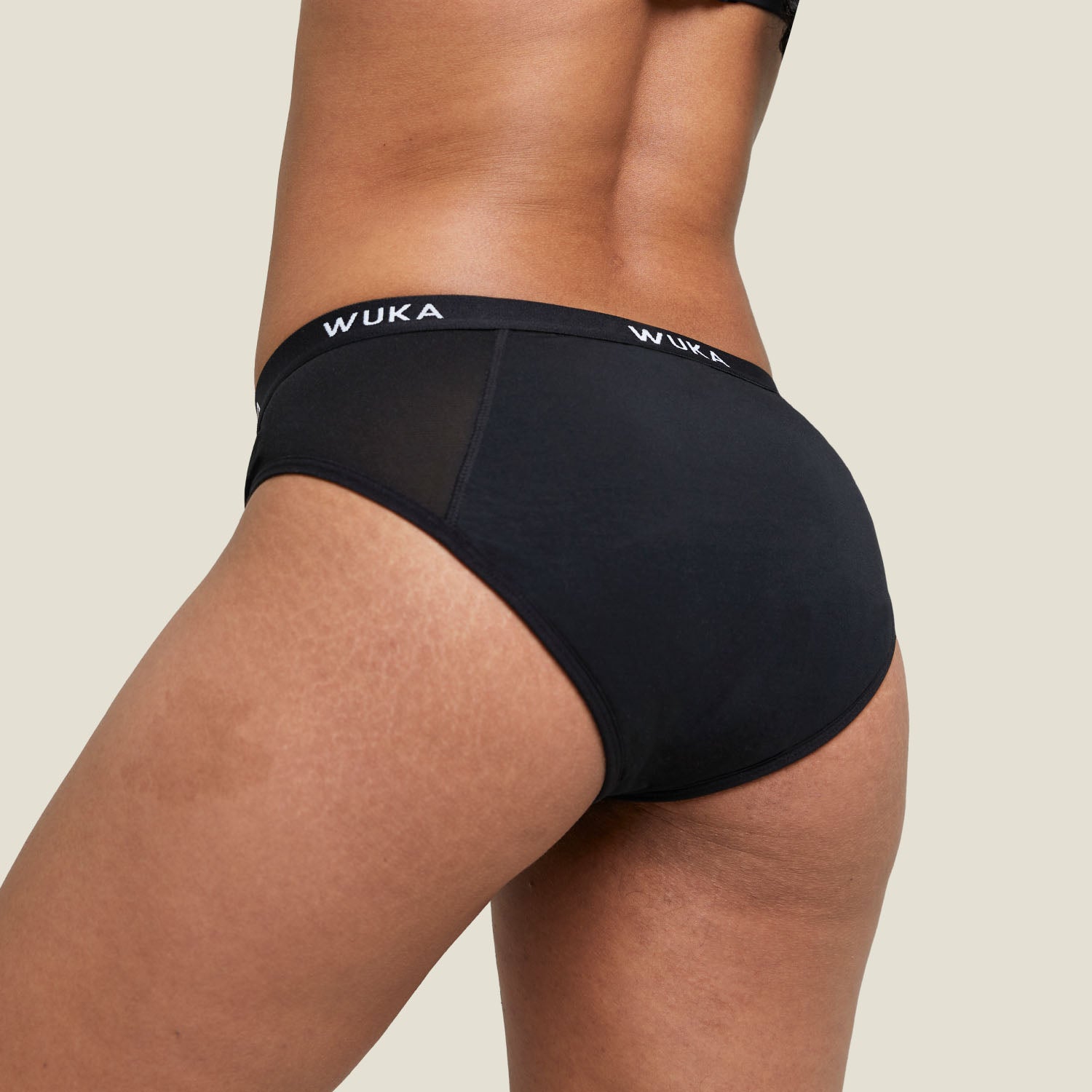 Rear view of WUKA Ultimate™ Midi Brief highlighting full coverage and leak-proof protection for overnight period use.