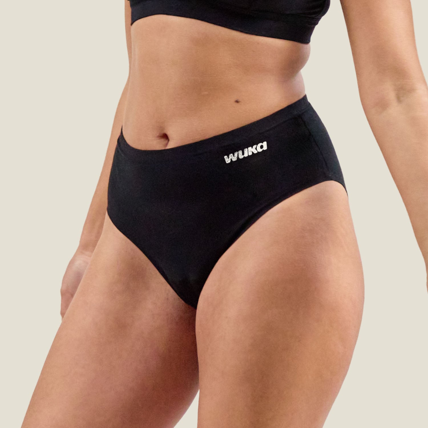 Side view of the WUKA Stretch Cotton Midi Brief designed for heavy period flow, featuring soft cotton fabric and stretchable waistband.