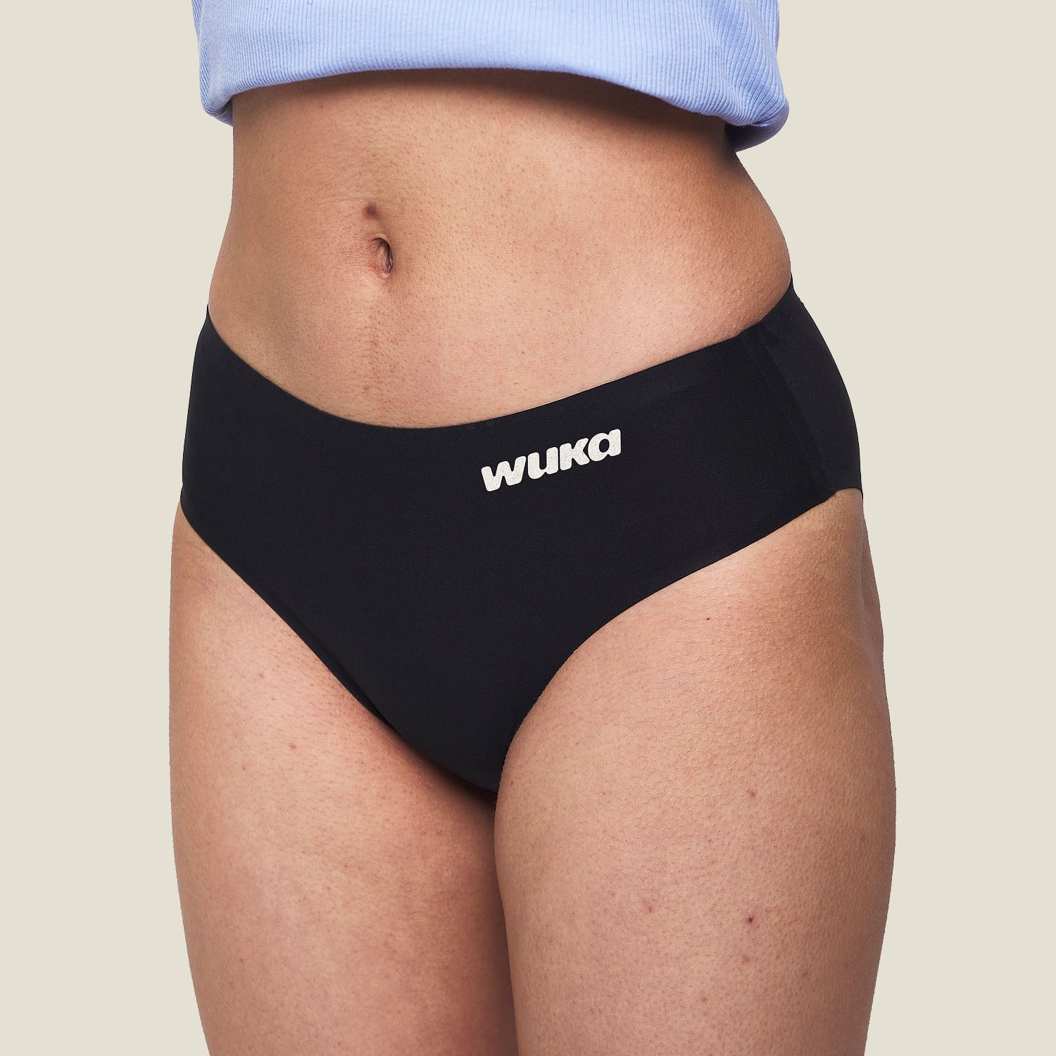 Side angle of WUKA Teen Stretch™ Super Heavy Period Pants – showcasing the stretchy fit and sleek design tailored for teen bodies.