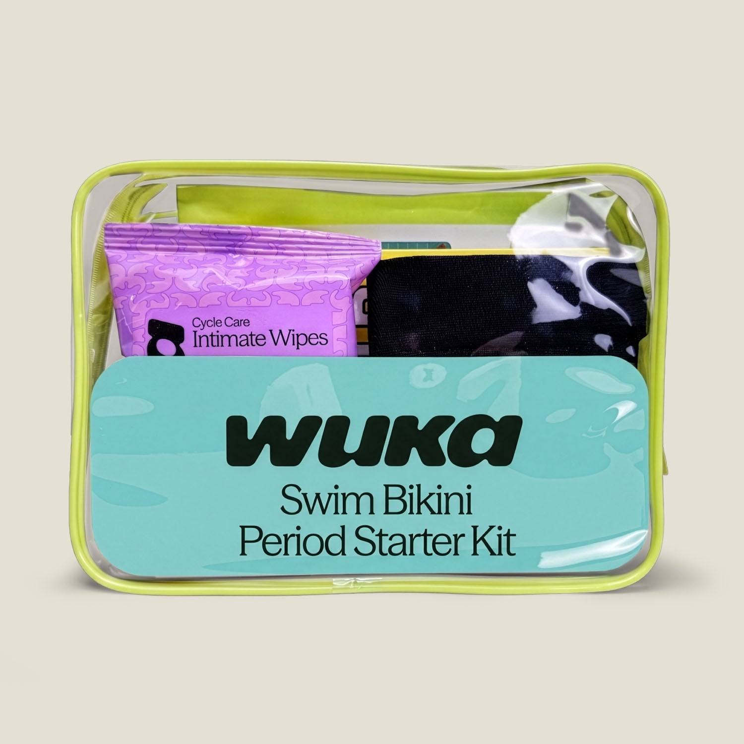 Wuka swim bikini period starter kit with clear case on beige background