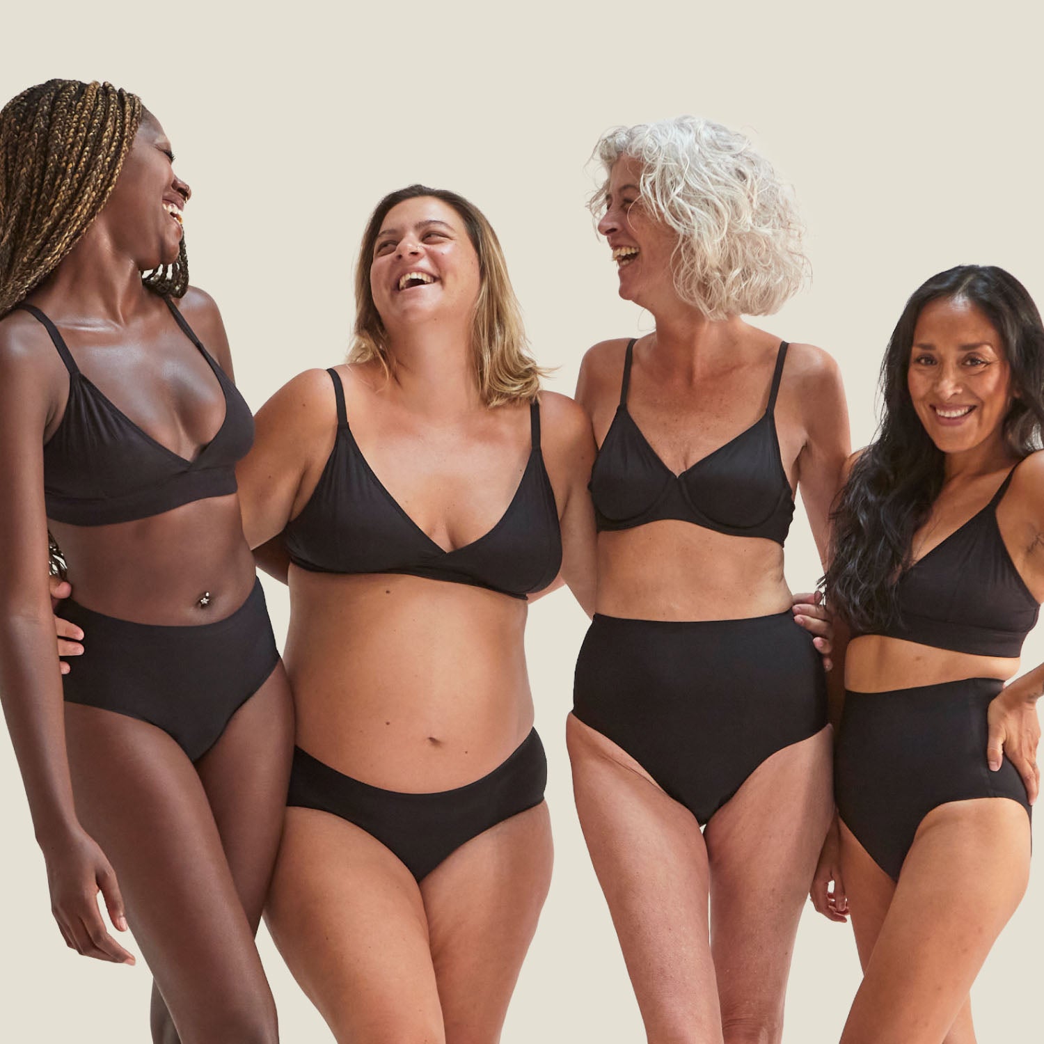 Group of diverse women wearing Drytech™ incontinence and period briefs in black, showcasing inclusive sizing and confidence.